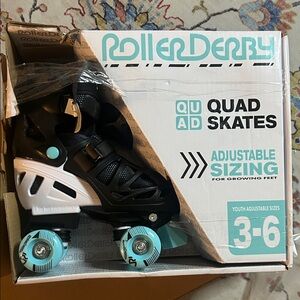 Roller Derby Kids Adjustable Quad Skates in Teal and Black